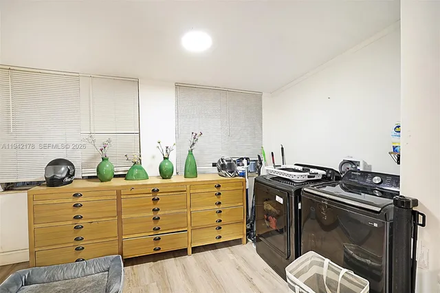 a kitchen with a stove and cabinets