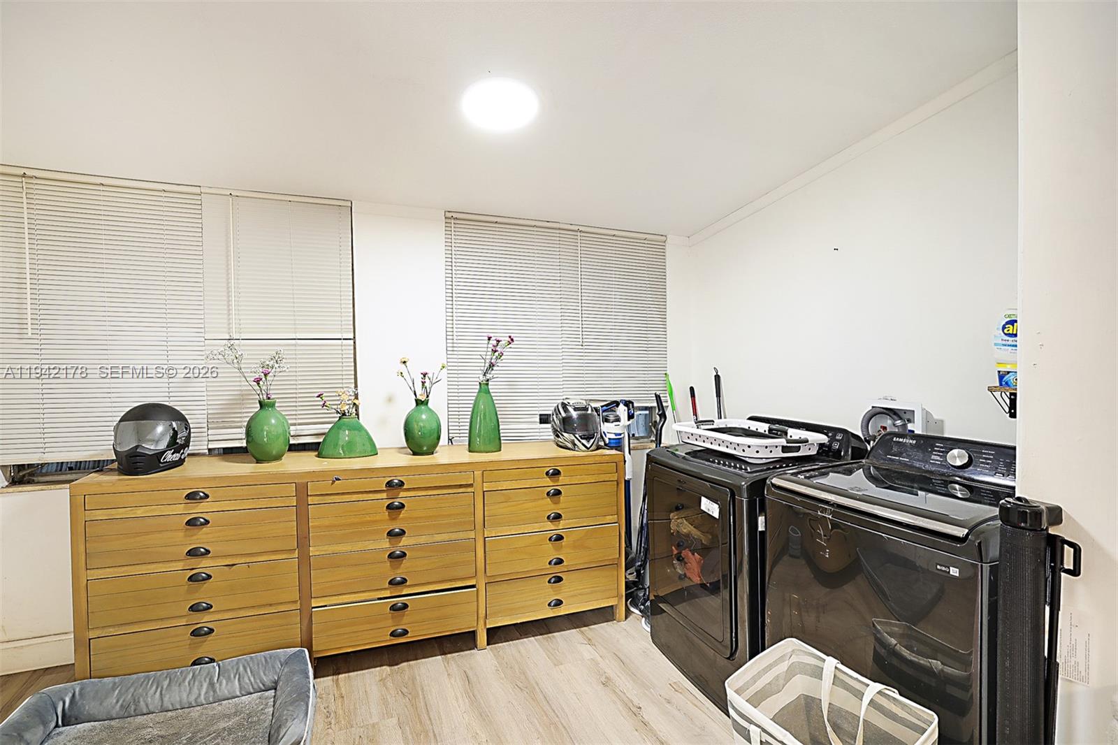 3021 Avenue J Riviera Beach, FL 33404 - Photo 9 of 17 a kitchen with a stove and cabinets