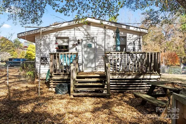 a large building with a large window and outdoor seating