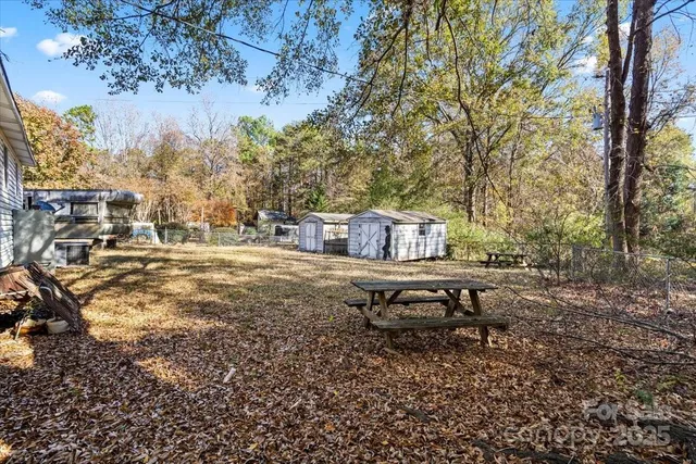 a garden view with a bench