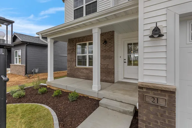 front view of a house with white walls