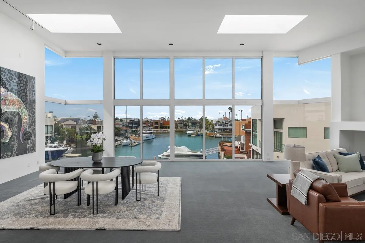 25 Green Turtle Road Coronado, CA 92118 - Photo 12 of 51 a living room with furniture and a large window