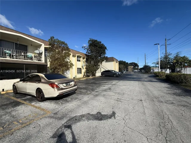 a car parked in front of a building