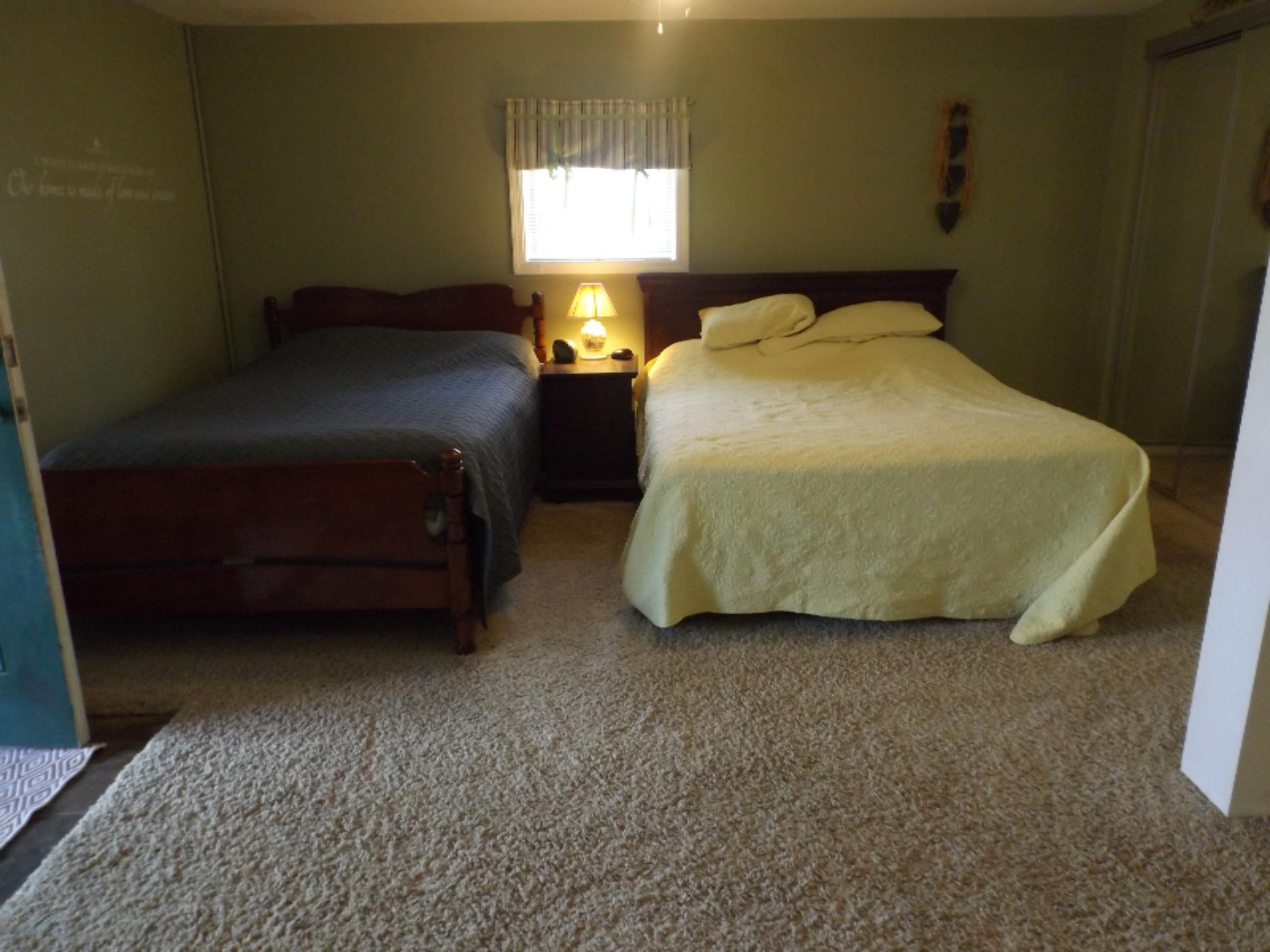 8300 North Sunset Road Reading, MI 49274 - Photo 12 of 26 Family room/Beds