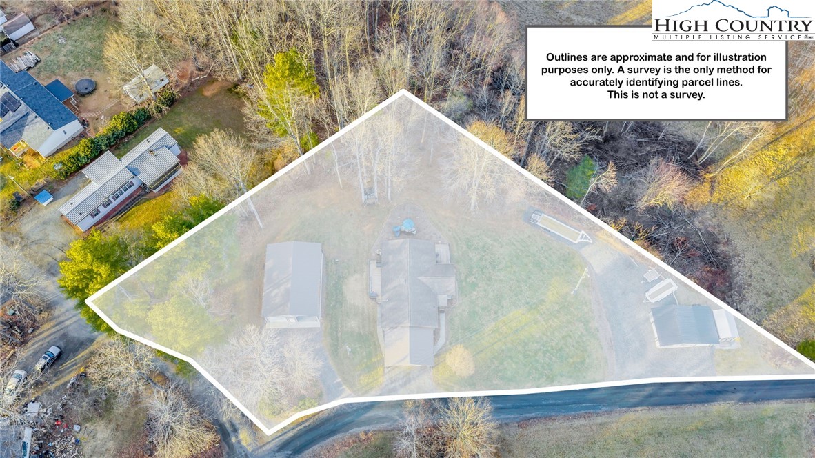 747 Nathans Creek School Road Crumpler, NC 28617 - Photo 2 of 42 a view of swimming pool with a bench