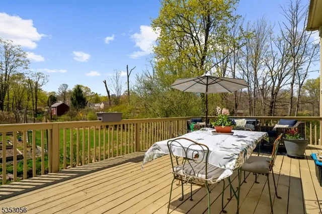 a view of a patio with furniture