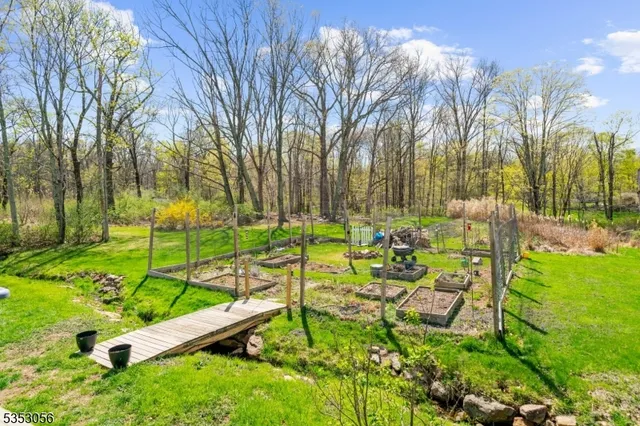 a view of yard with table and chairs