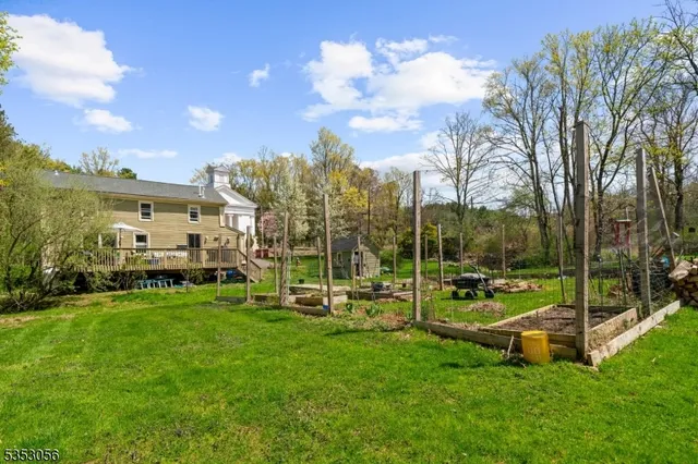 a view of a park with houses