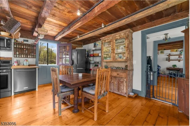 a view of a dining room with furniture