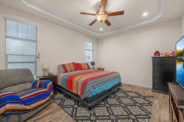 a living room with a bed and a couch