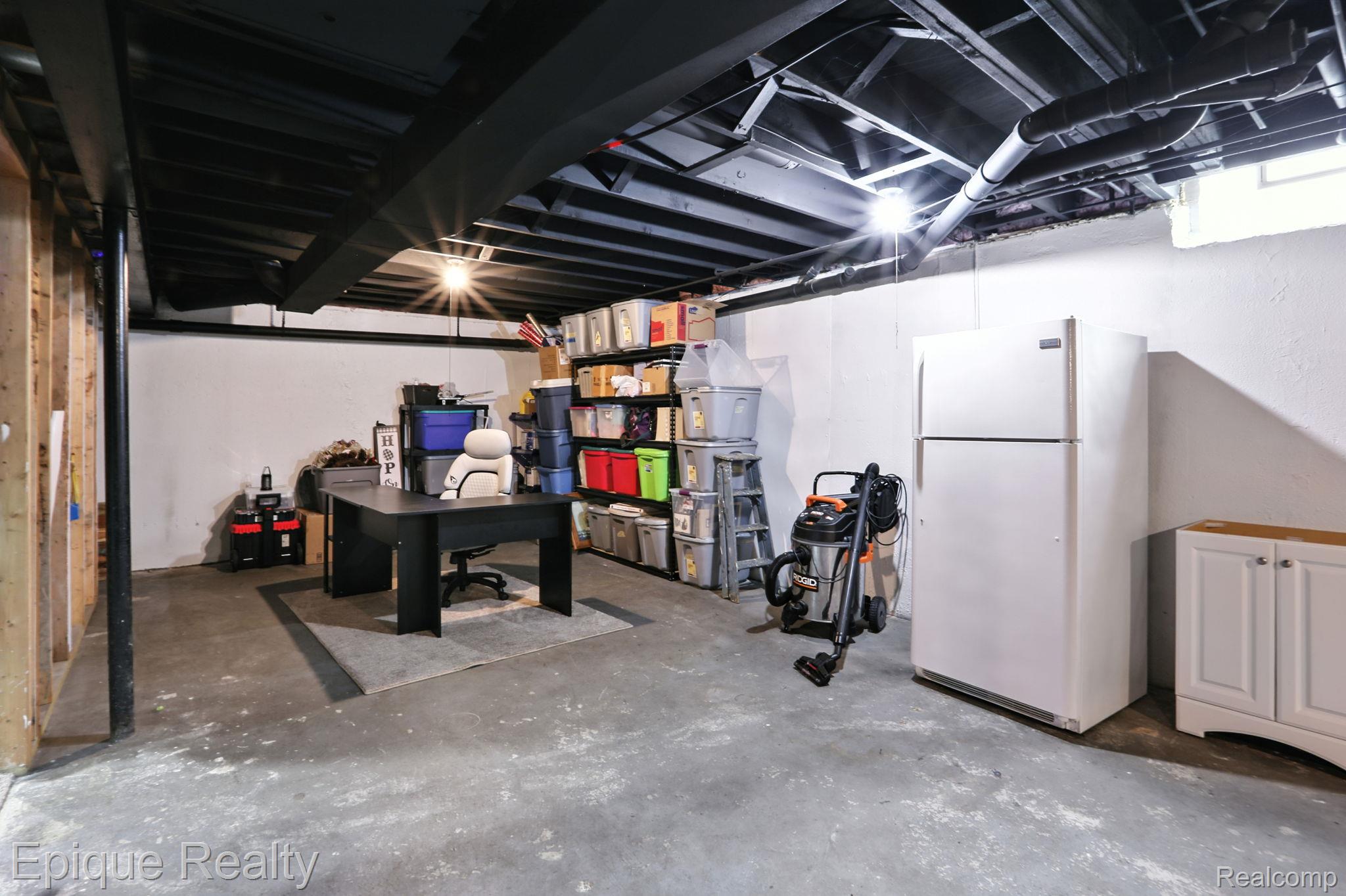 8529 22 Mile Road Utica, MI 48317 - Photo 35 of 40 Unfinished below grade area featuring freestanding refrigerator