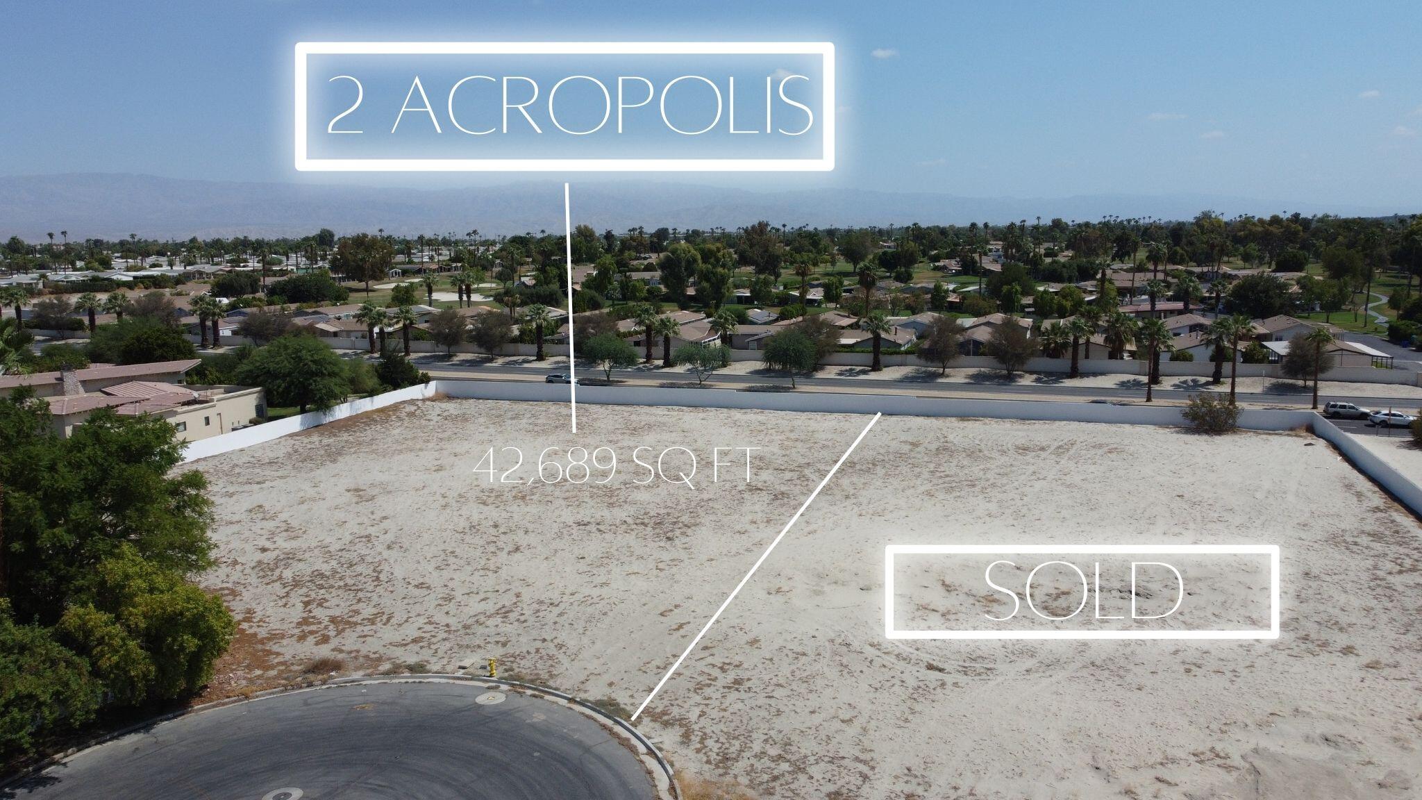 2 Acropolis Circle Rancho Mirage, CA 92270 - Photo 2 of 5 a view of a street with a parking space