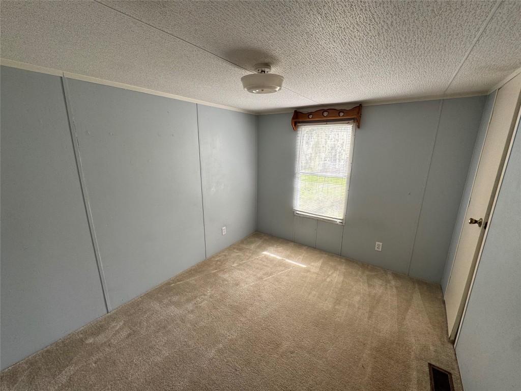 23278 Morgan Cemetery Road Splendora, TX 77372 - Photo 12 of 27 a view of an empty room with a window