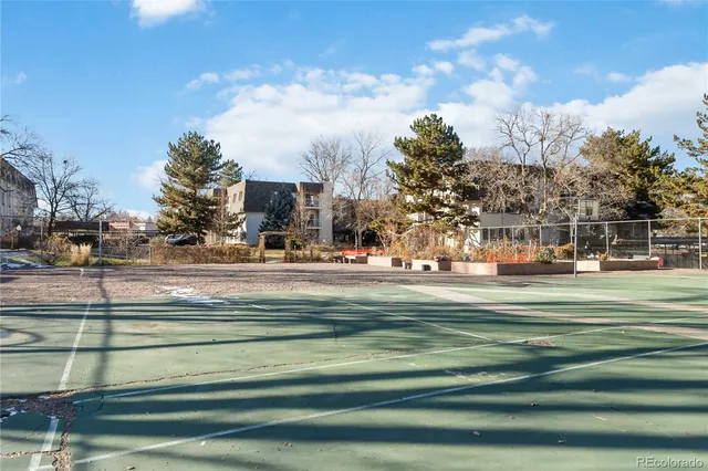 a view of street with houses on both side