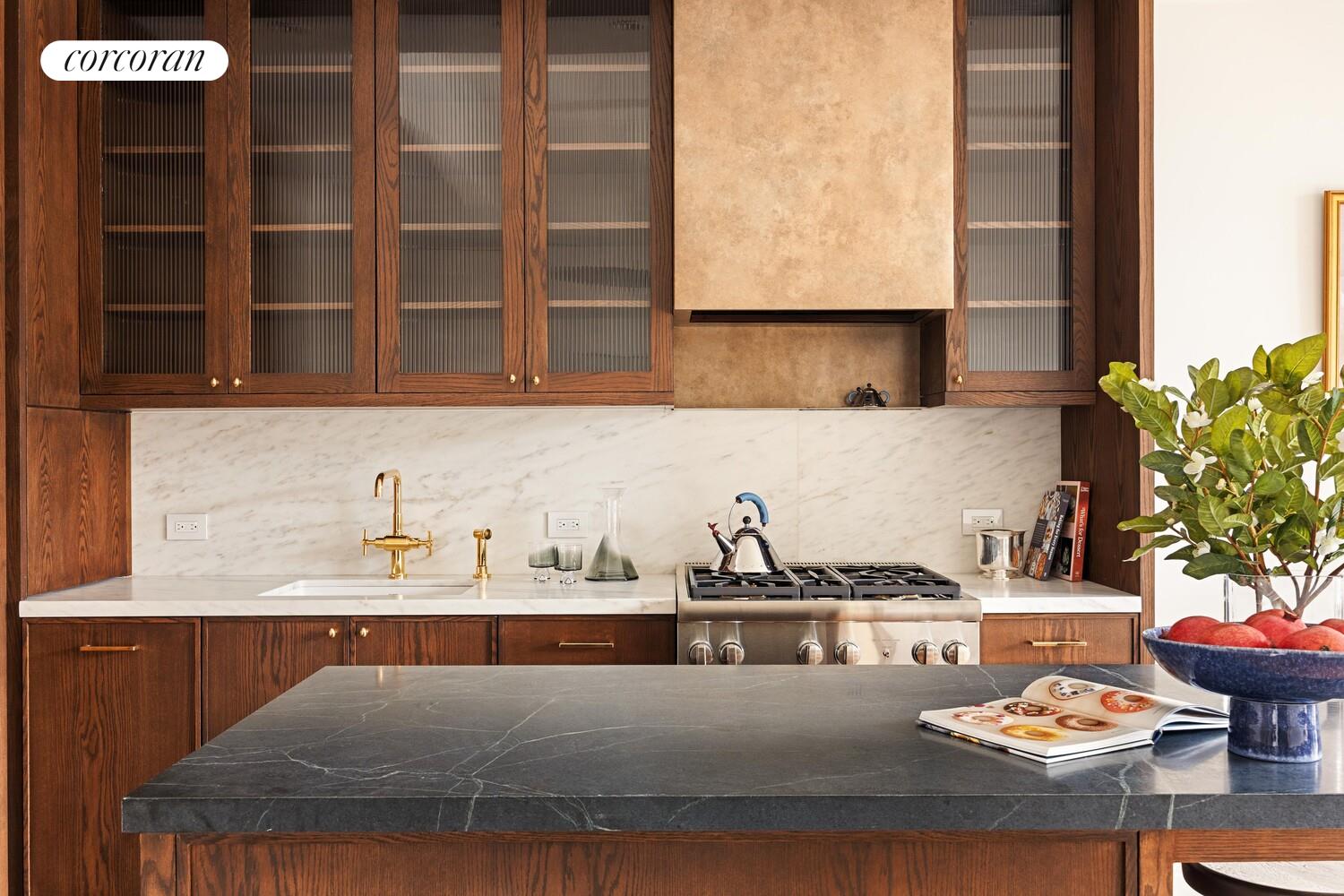 127 Kent Avenue, Unit 3G Brooklyn, NY 11249 - Photo 4 of 16 a kitchen with a sink and a stove