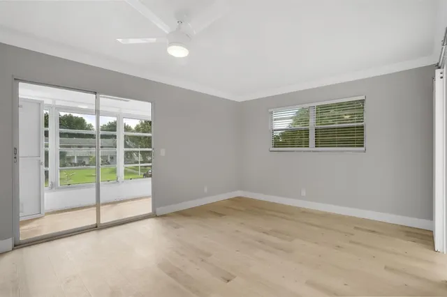 an empty room with windows