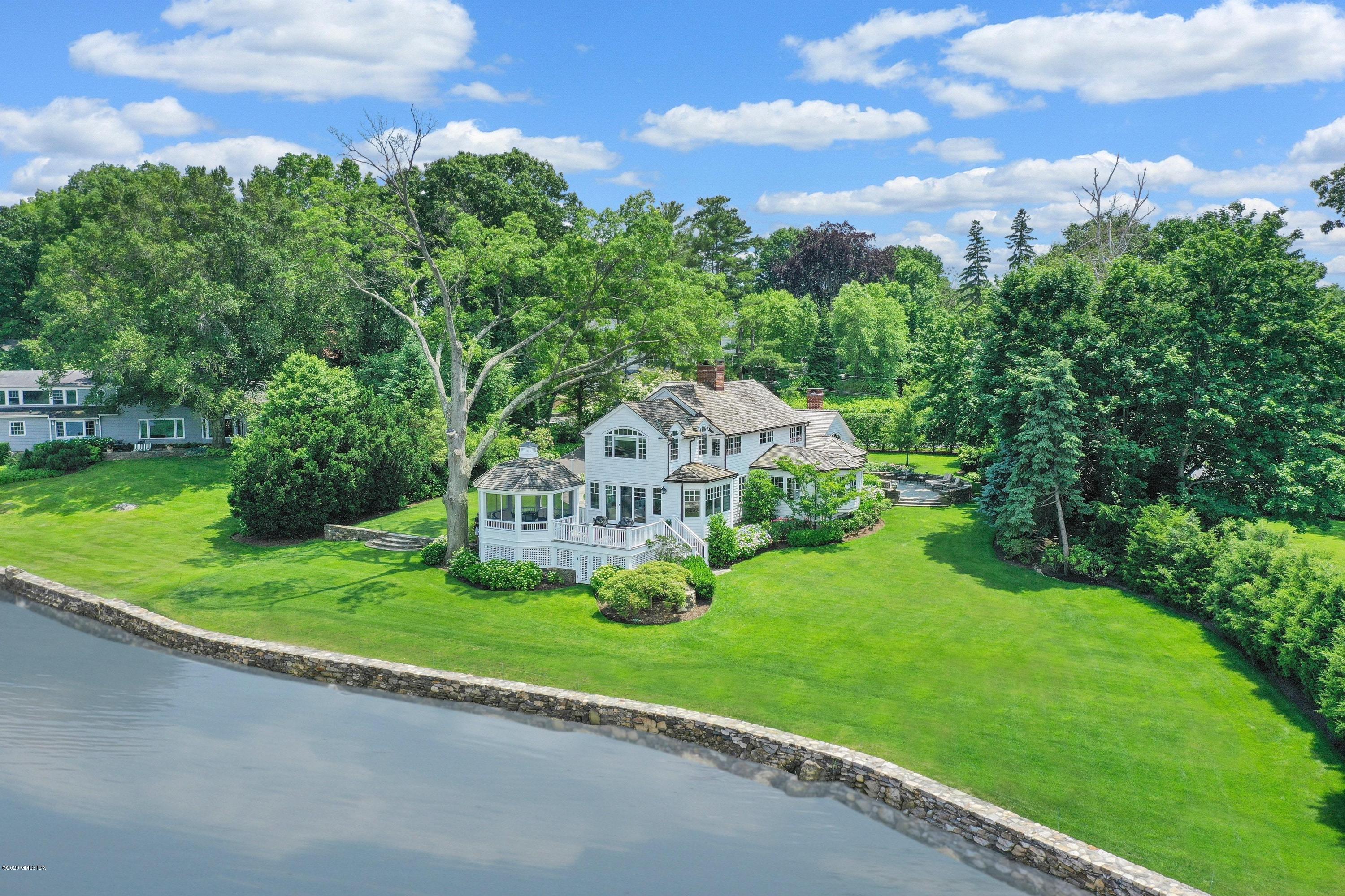 16 Marlow Court Riverside, CT 06878 - Photo 1 of 31 a view of a house with garden and a trees