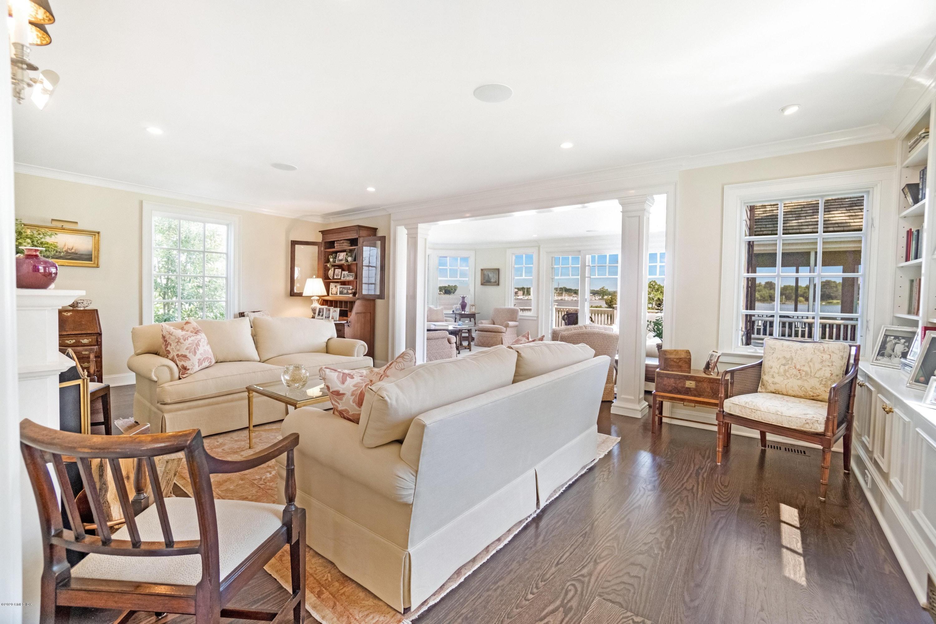 16 Marlow Court Riverside, CT 06878 - Photo 14 of 31 a living room with furniture and a large window