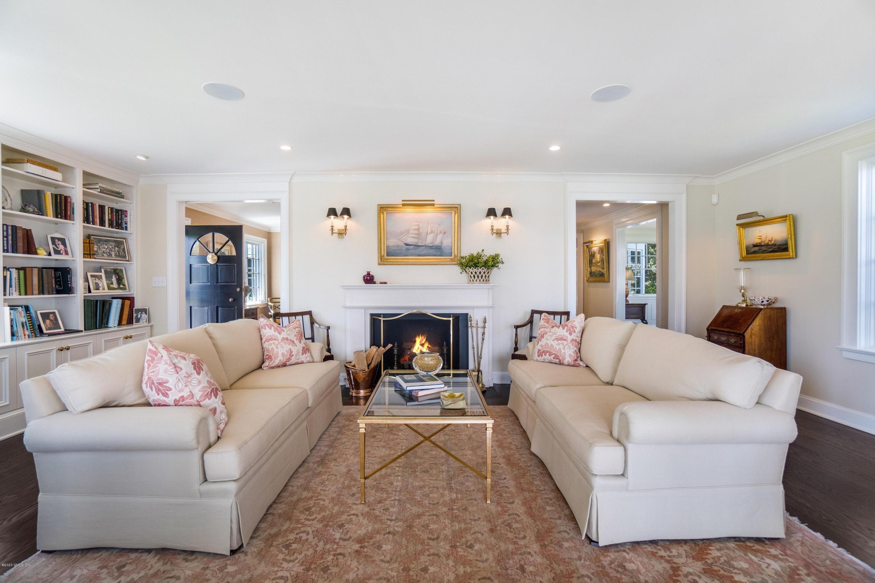 16 Marlow Court Riverside, CT 06878 - Photo 15 of 31 a living room with furniture and a fireplace