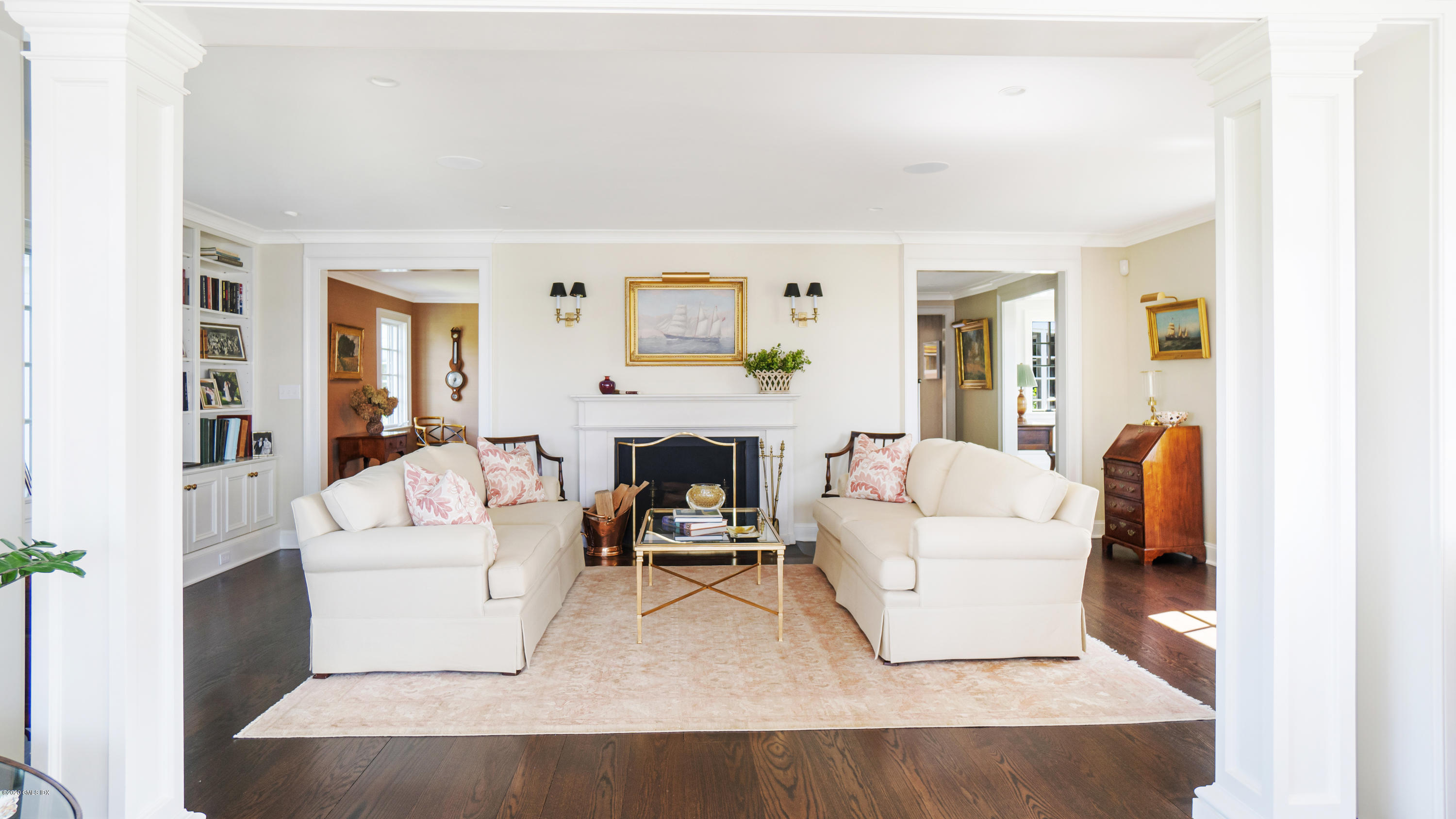16 Marlow Court Riverside, CT 06878 - Photo 16 of 31 a living room with furniture and a fireplace