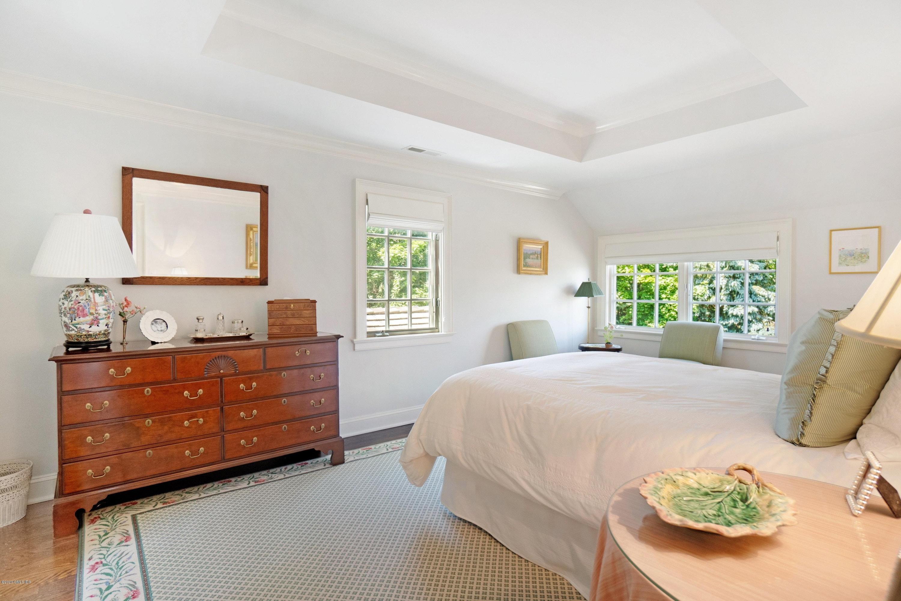 16 Marlow Court Riverside, CT 06878 - Photo 25 of 31 a bedroom with a bed and a window