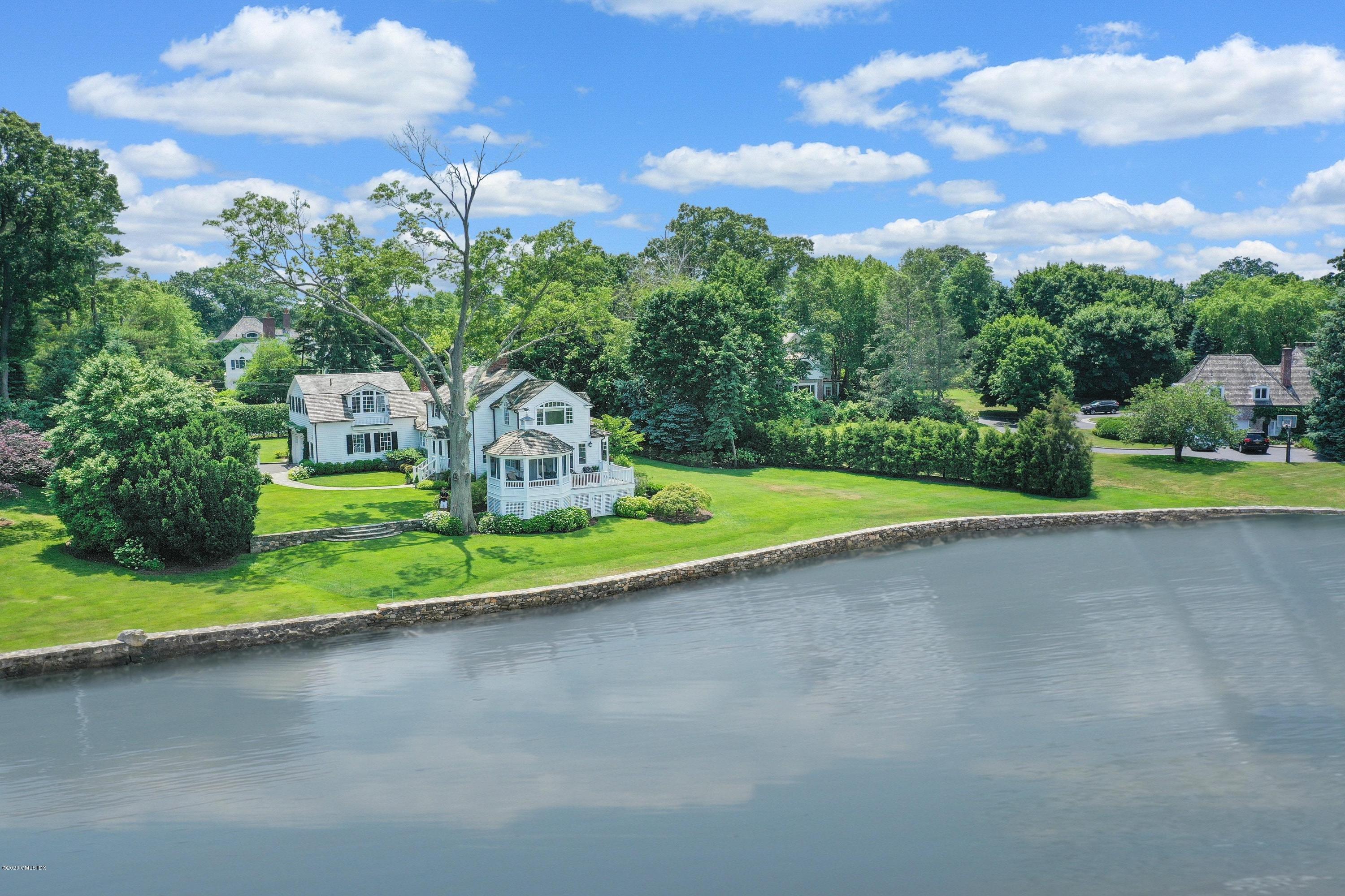 16 Marlow Court Riverside, CT 06878 - Photo 29 of 31 a view of a garden with a house