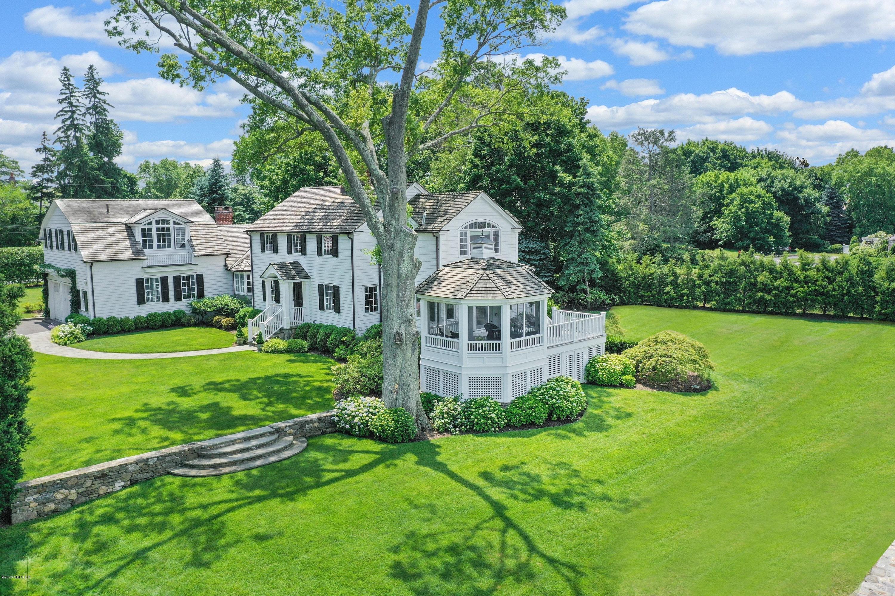 16 Marlow Court Riverside, CT 06878 - Photo 3 of 31 a front view of a house with garden