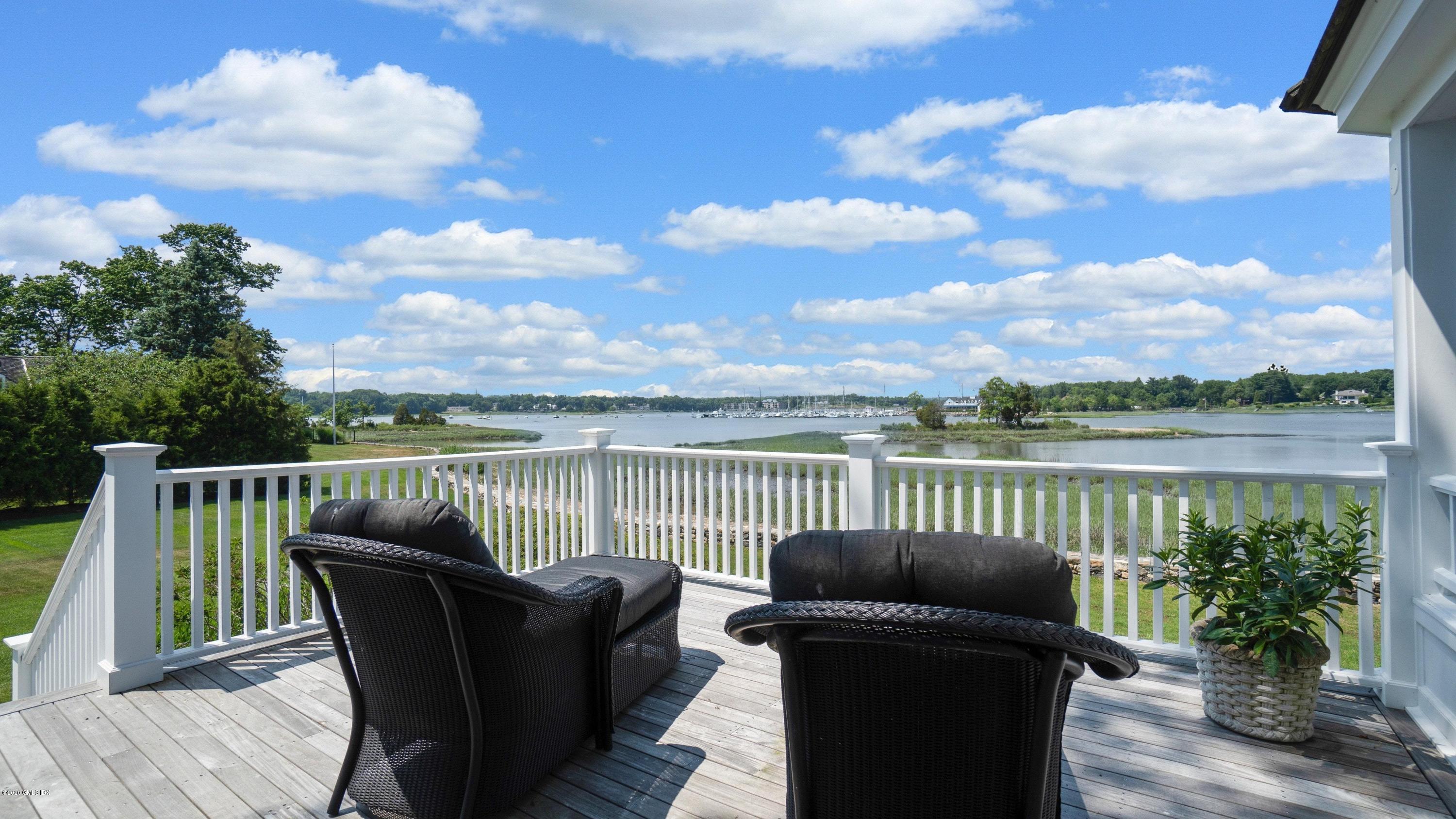 16 Marlow Court Riverside, CT 06878 - Photo 4 of 31 a view of a chair and table on the wooden deck