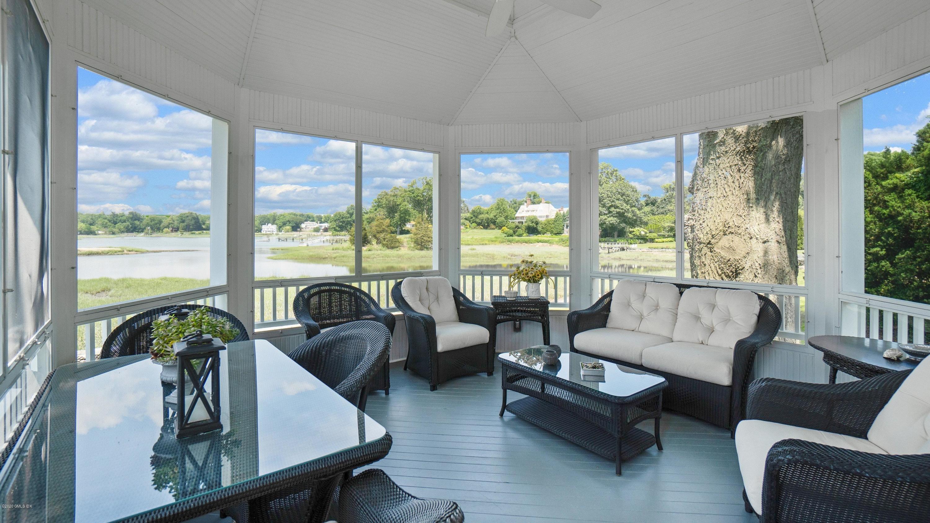 16 Marlow Court Riverside, CT 06878 - Photo 5 of 31 a living room with furniture and a large window