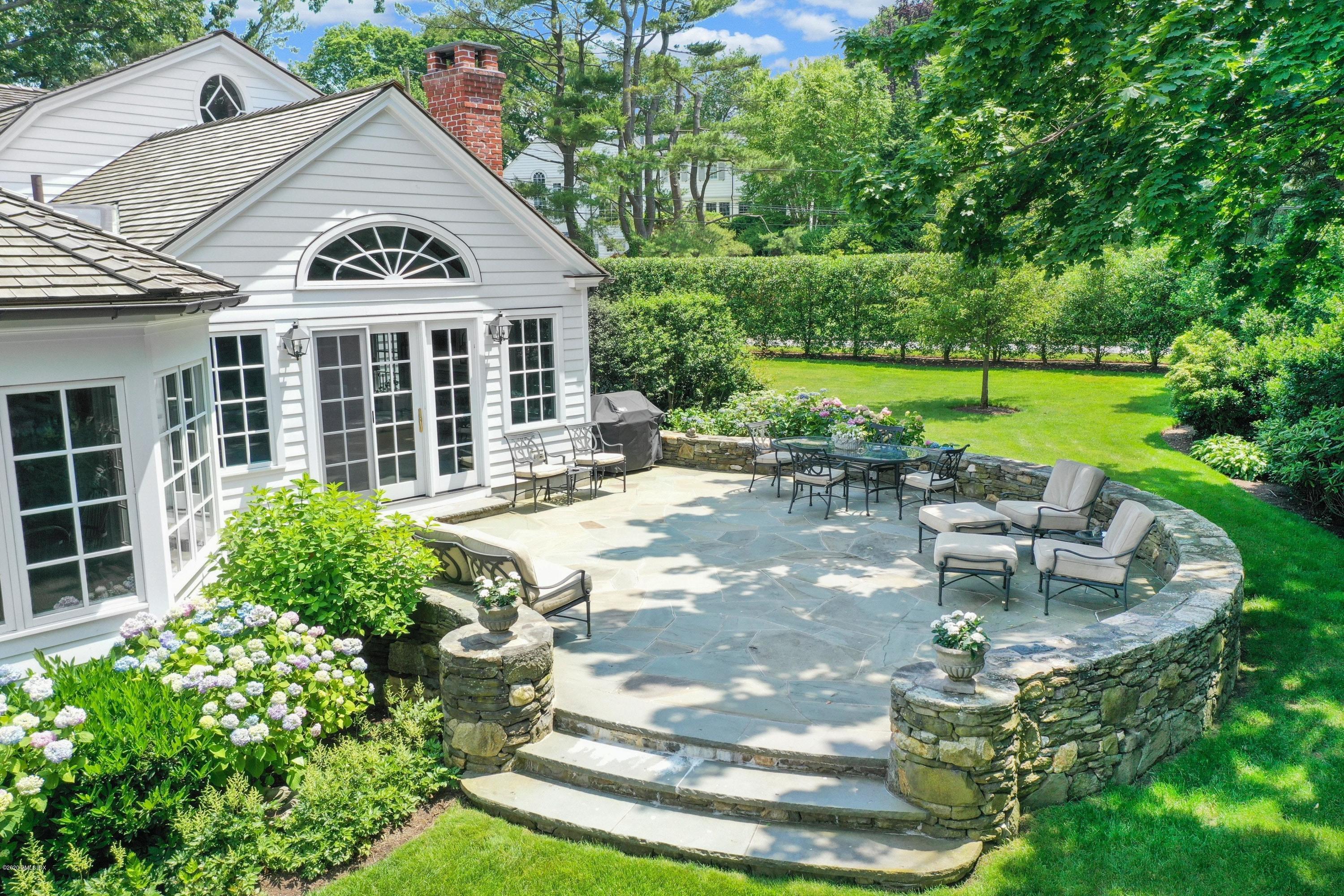 16 Marlow Court Riverside, CT 06878 - Photo 7 of 31 a view of a house with backyard and sitting area