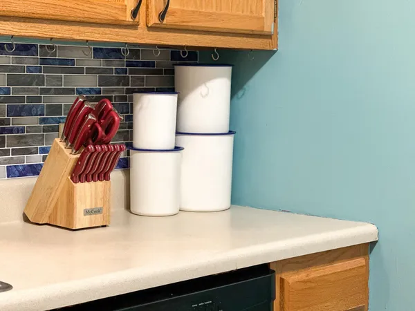 a kitchen with a sink and a window