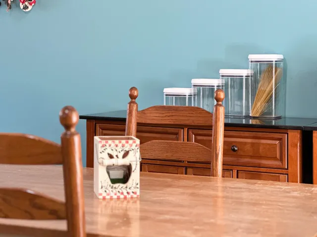 a bedroom with a bed and a mirror