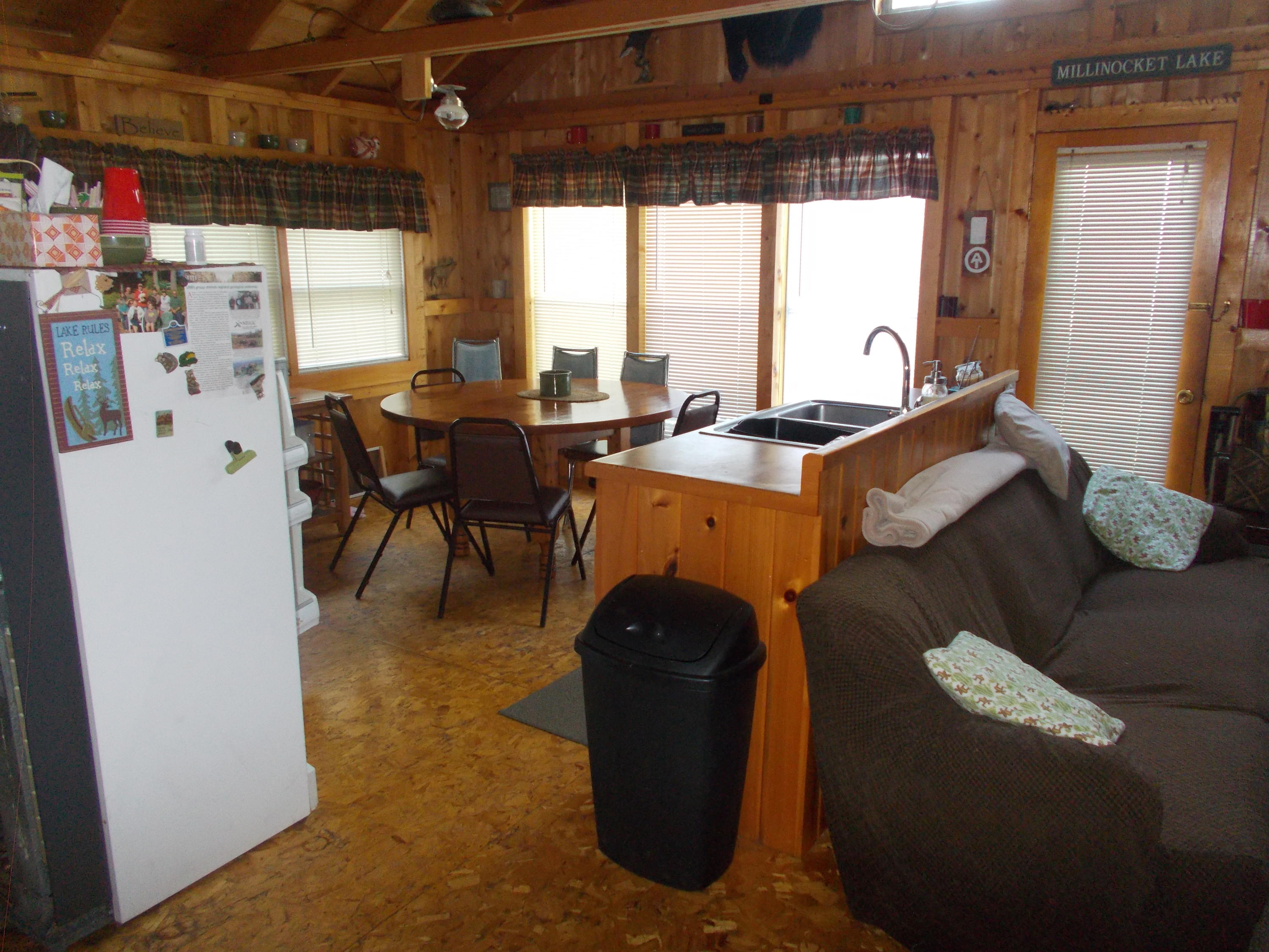 72 Puckerbrush Trail Millinocket, ME 04462 - Photo 38 of 48 Kitchen has many windows for lake view