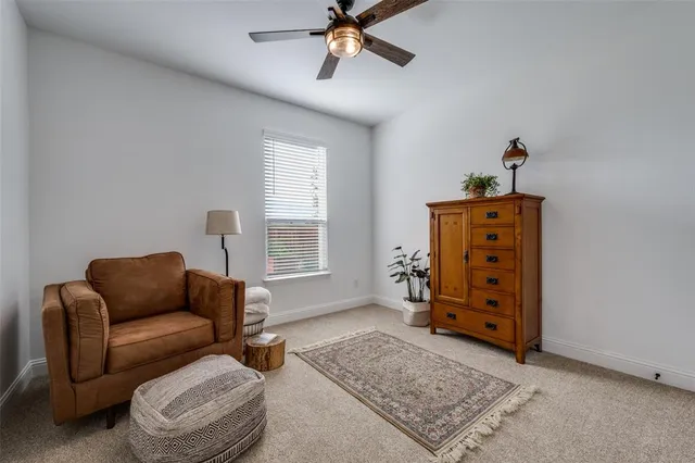 a living room with furniture and window