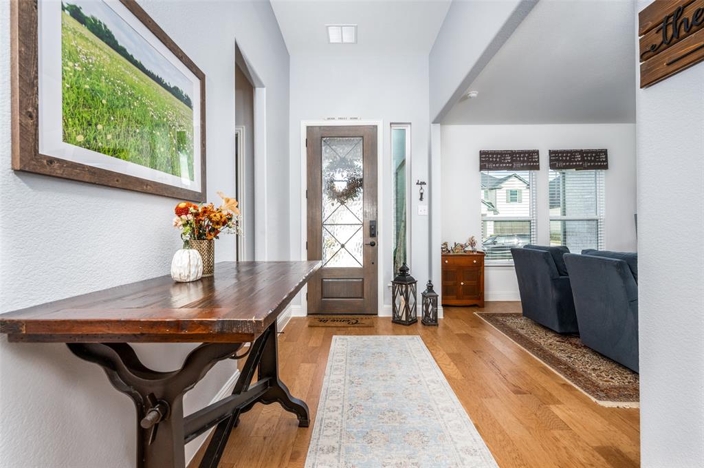 337 Augusta Court Oak Point, TX 75068 - Photo 2 of 26 a dining room with furniture and window