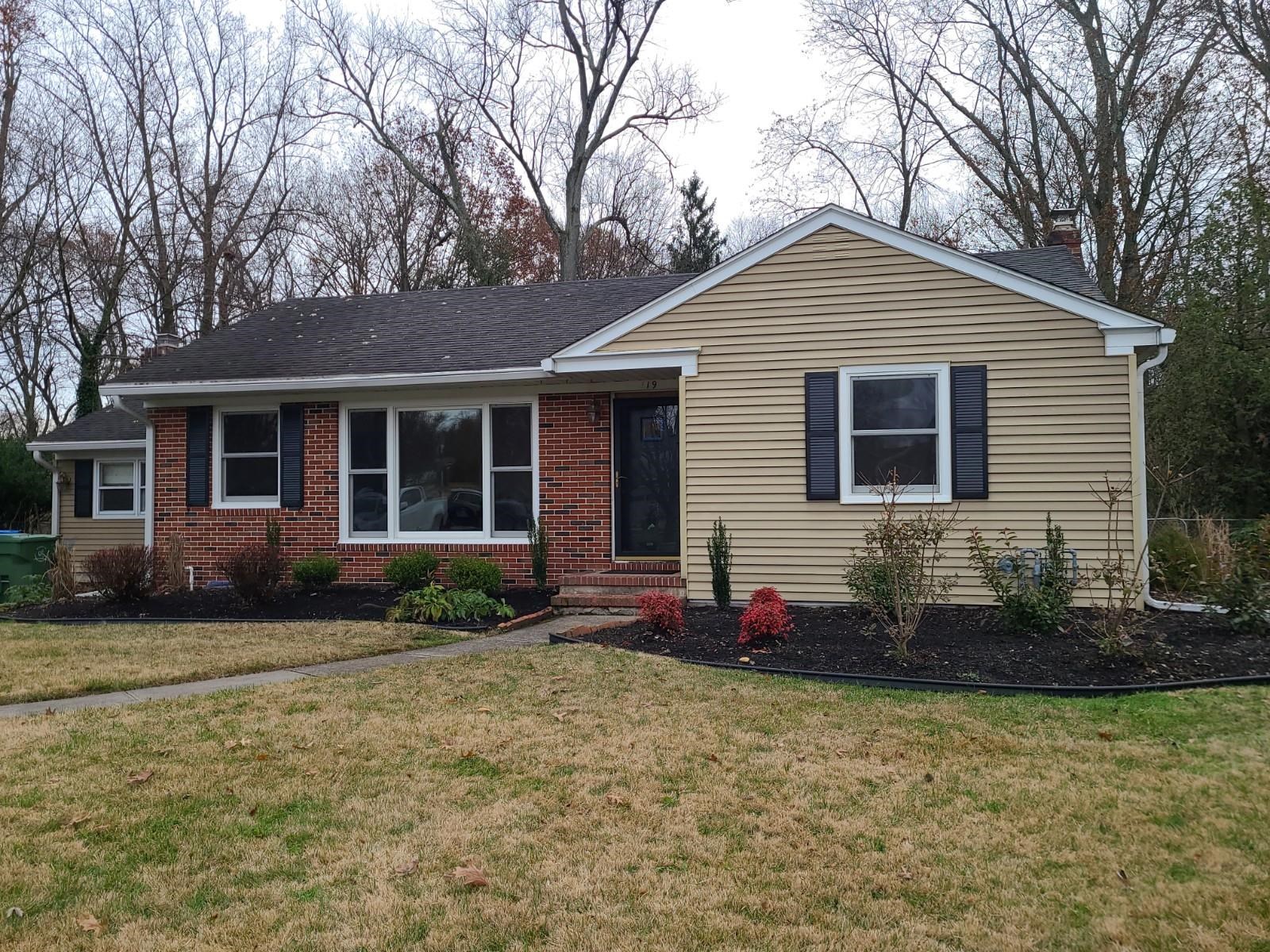 119 Kenwood Drive Cherry Hill, NJ 08034 - Photo 1 of 23 a front view of a house with a yard