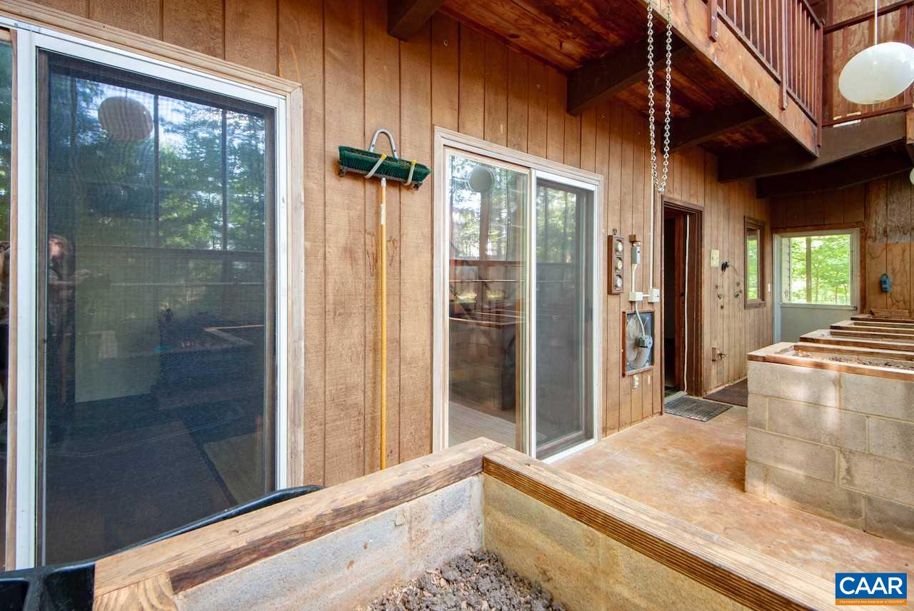 140 Rainbow Ridge Road Faber, VA 22938 - Photo 7 of 32 a view of a room with a large window