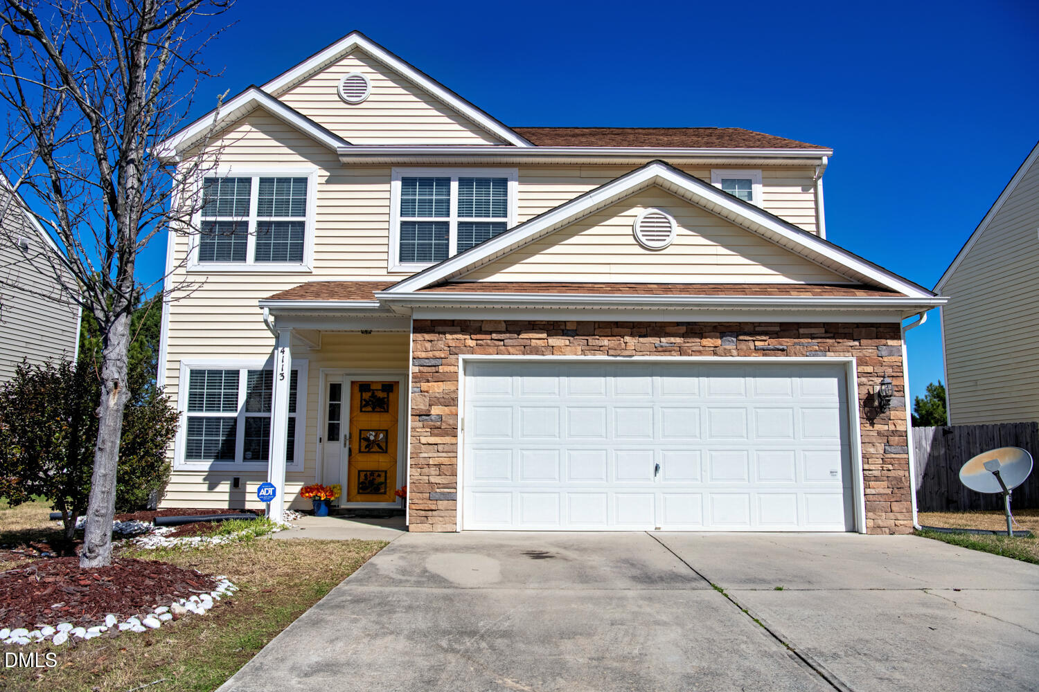 4113 Lady Slipper Lane Durham, NC 27704 - Photo 1 of 28 a view of a house with a yard and garage