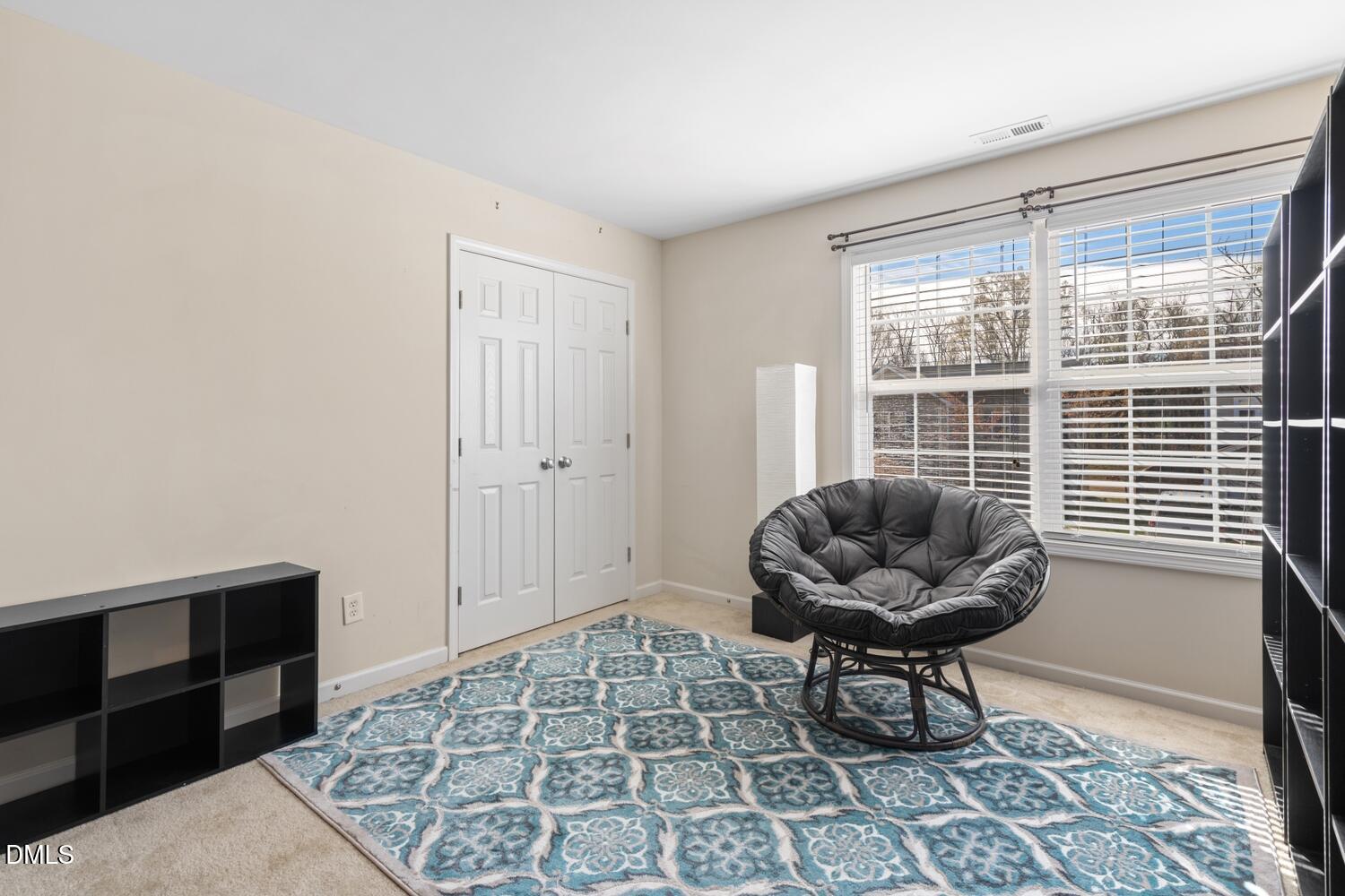 4113 Lady Slipper Lane Durham, NC 27704 - Photo 13 of 28 a living room with furniture and a window