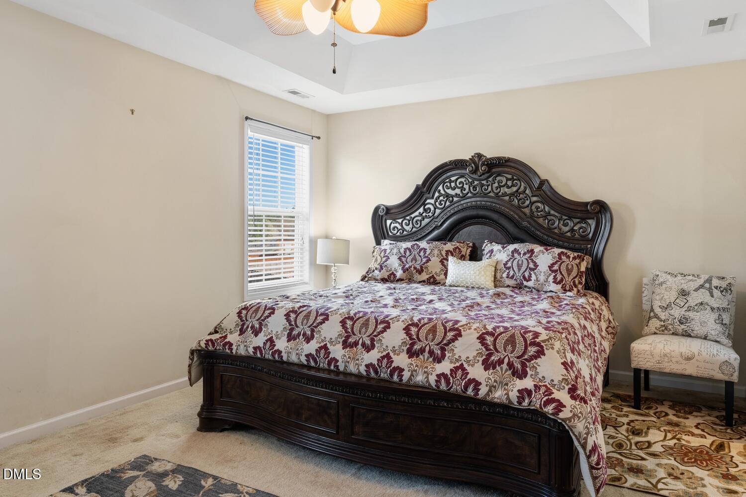 4113 Lady Slipper Lane Durham, NC 27704 - Photo 14 of 28 a bedroom with a bed and window