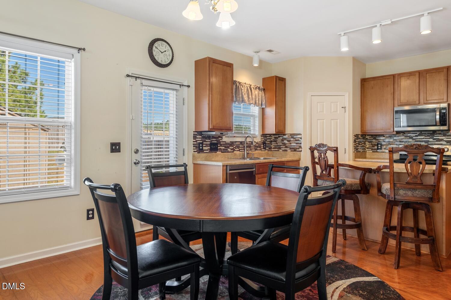 4113 Lady Slipper Lane Durham, NC 27704 - Photo 2 of 28 a view of a dining room with furniture