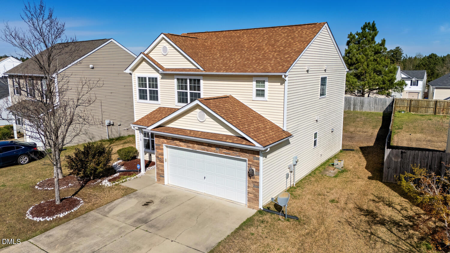 4113 Lady Slipper Lane Durham, NC 27704 - Photo 23 of 28 a view of a house with a wooden deck