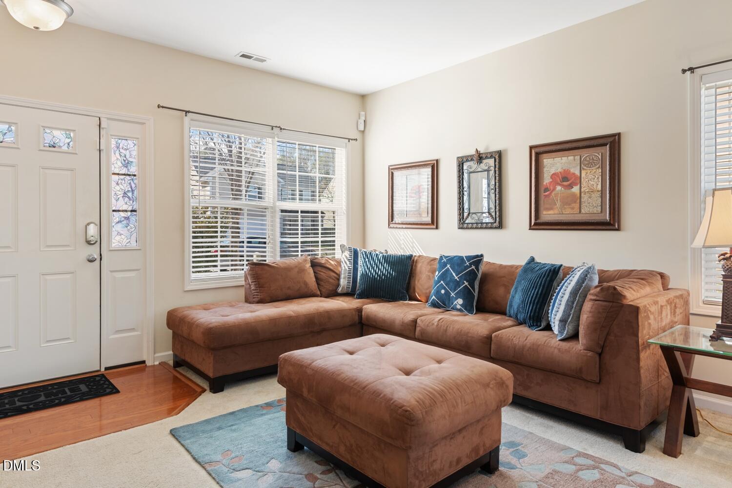 4113 Lady Slipper Lane Durham, NC 27704 - Photo 5 of 28 a living room with furniture and a window