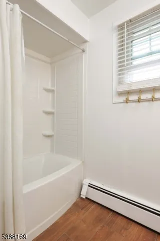 a bathroom with bathtub