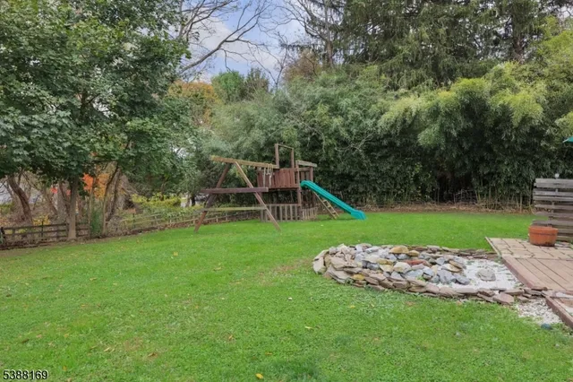 a view of a garden with a slide