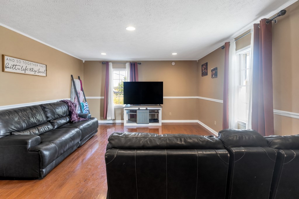 2580 Crofton Dawson Road Crofton, KY 42217 - Photo 16 of 50 a living room with furniture and a flat screen tv