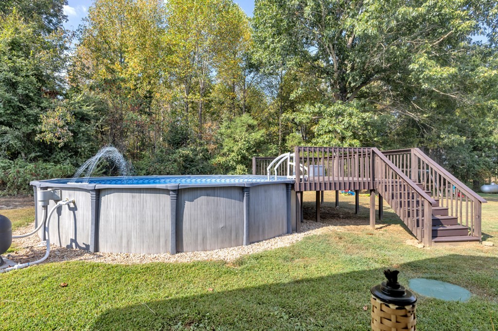 2580 Crofton Dawson Road Crofton, KY 42217 - Photo 32 of 50 a view of backyard with deck and garden