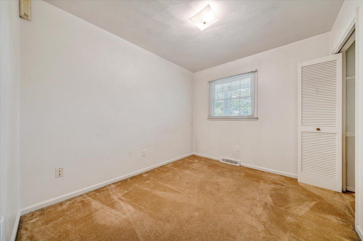 869 Lakeshore Terrace Road Hardy, VA 24101 - Photo 26 of 58 an empty room with windows