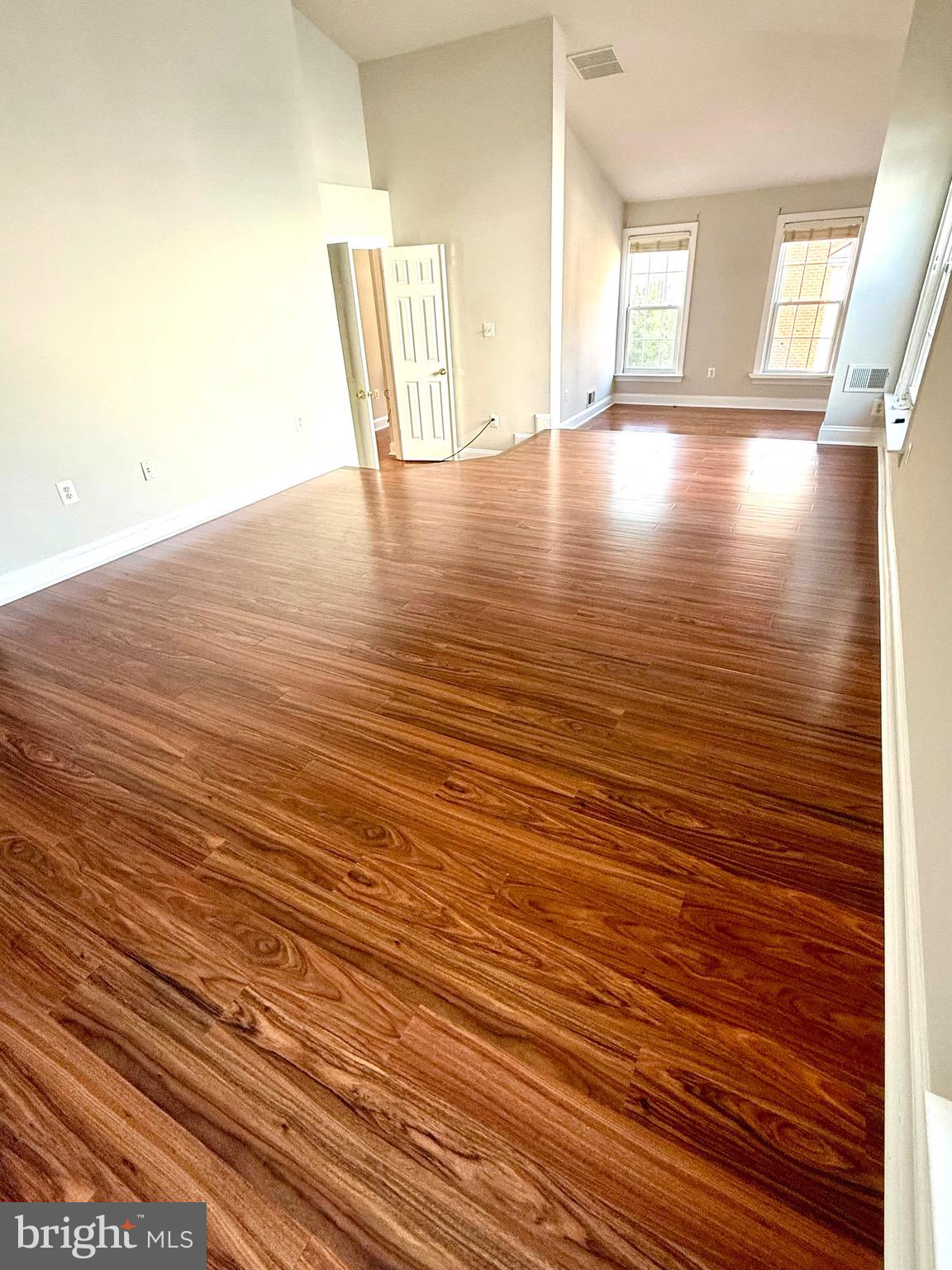 12447 Red Patch Lane Fairfax, VA 22033 - Photo 18 of 34 a view of a room with wooden floor and windows