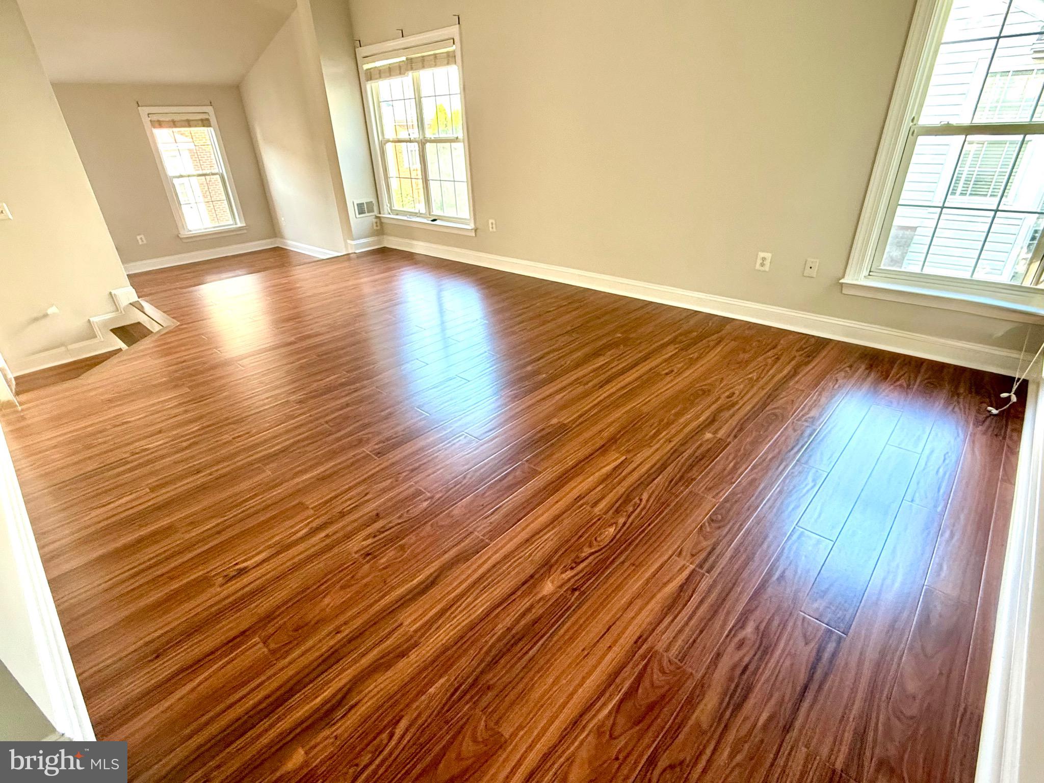 12447 Red Patch Lane Fairfax, VA 22033 - Photo 19 of 34 wooden floor in an empty room with a window